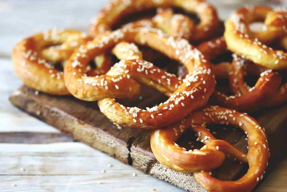 Hot and fresh bavarian pretzels served with beer cheese, hot mustard, and more at Hatchet House of Bemidji